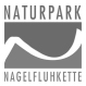 Logo of Naturpark Nagelfluhkette, featuring a stylized mountain silhouette. The design emphasizes natural landscapes and the park's focus on conservation and outdoor activities. The text is presented in a clean, modern font, enhancing clarity and recognition.